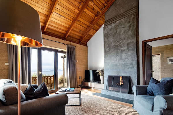 Premium Waterfront Cottage | Living area | Plasma TV, DVD player, iPod dock