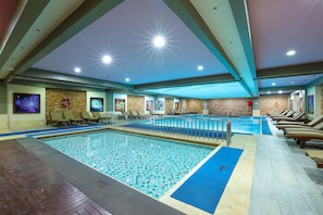 Indoor pool, outdoor pool, free pool cabanas, pool umbrellas