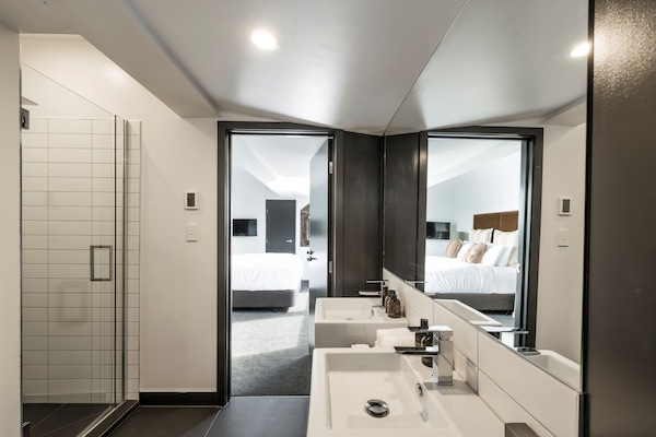 Penthouse | Bathroom | Designer toiletries, hair dryer, bathrobes, slippers