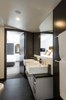 Penthouse | Bathroom | Designer toiletries, hair dryer, bathrobes, slippers