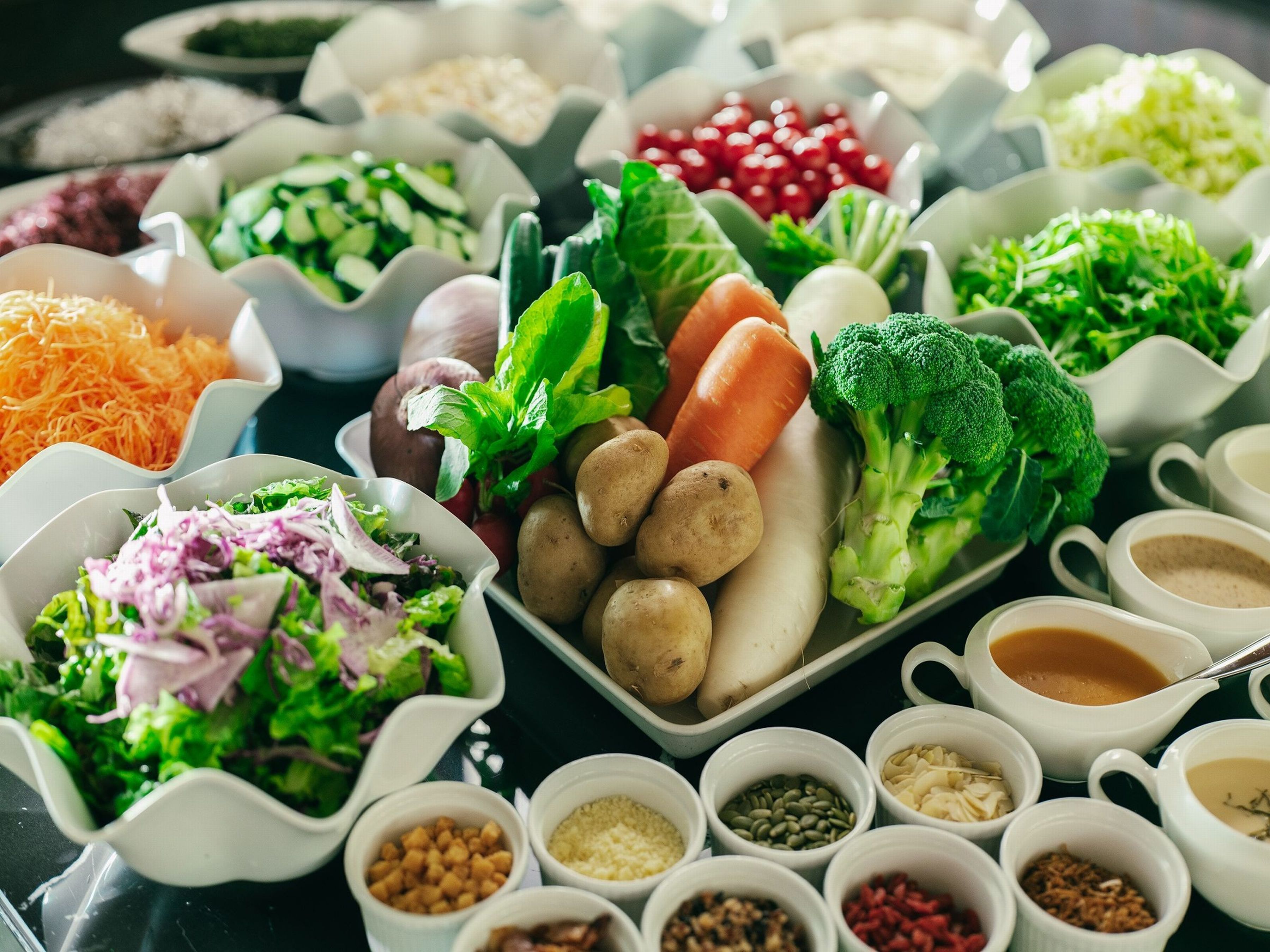 A variety of food items and condiments arranged on a table.