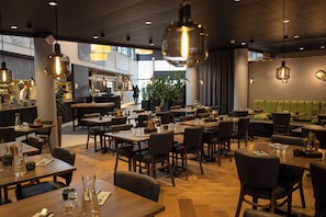 Breakfast, lunch, dinner served; local and international cuisine
