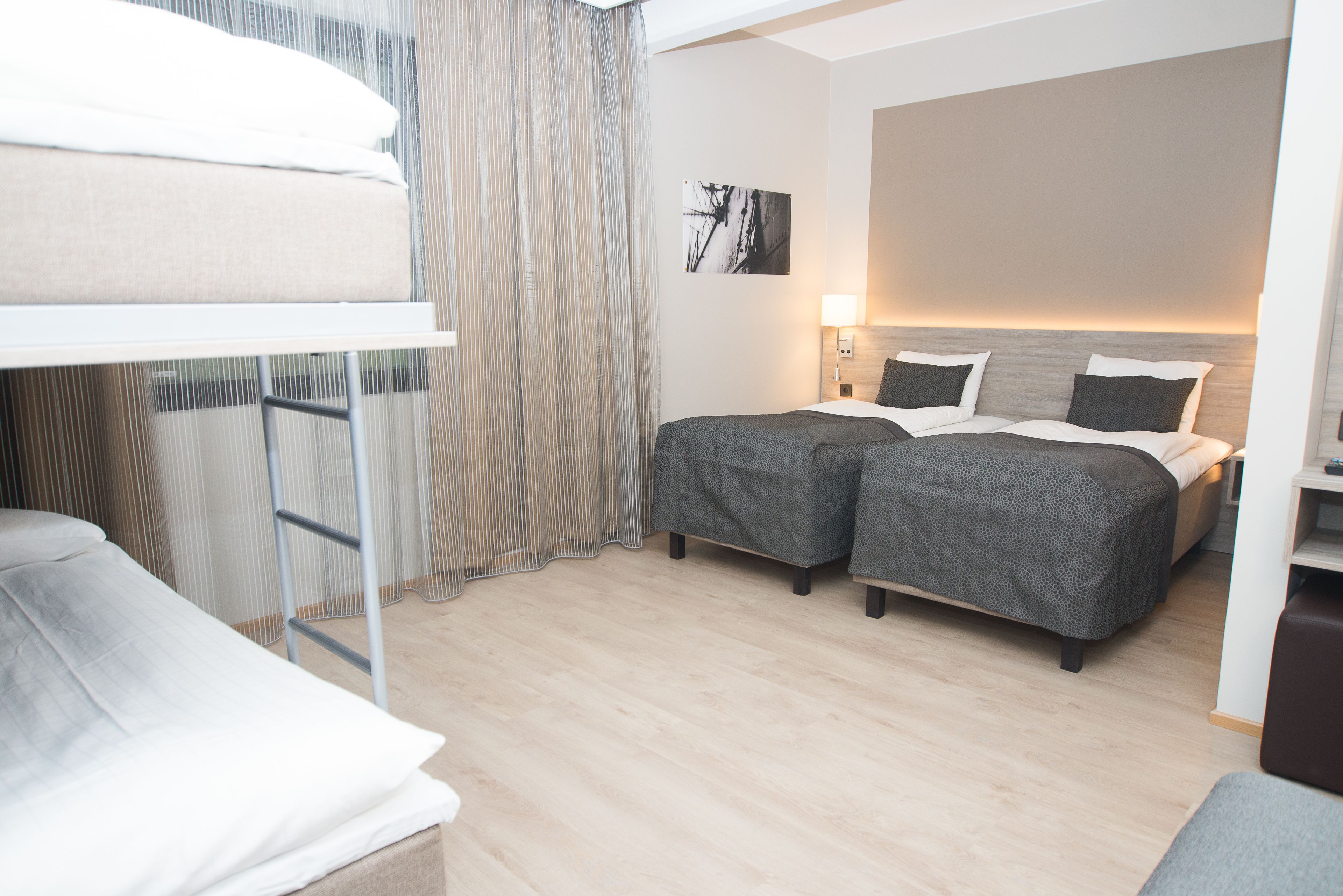 family room | 1 bedroom, desk, blackout curtains, soundproofing