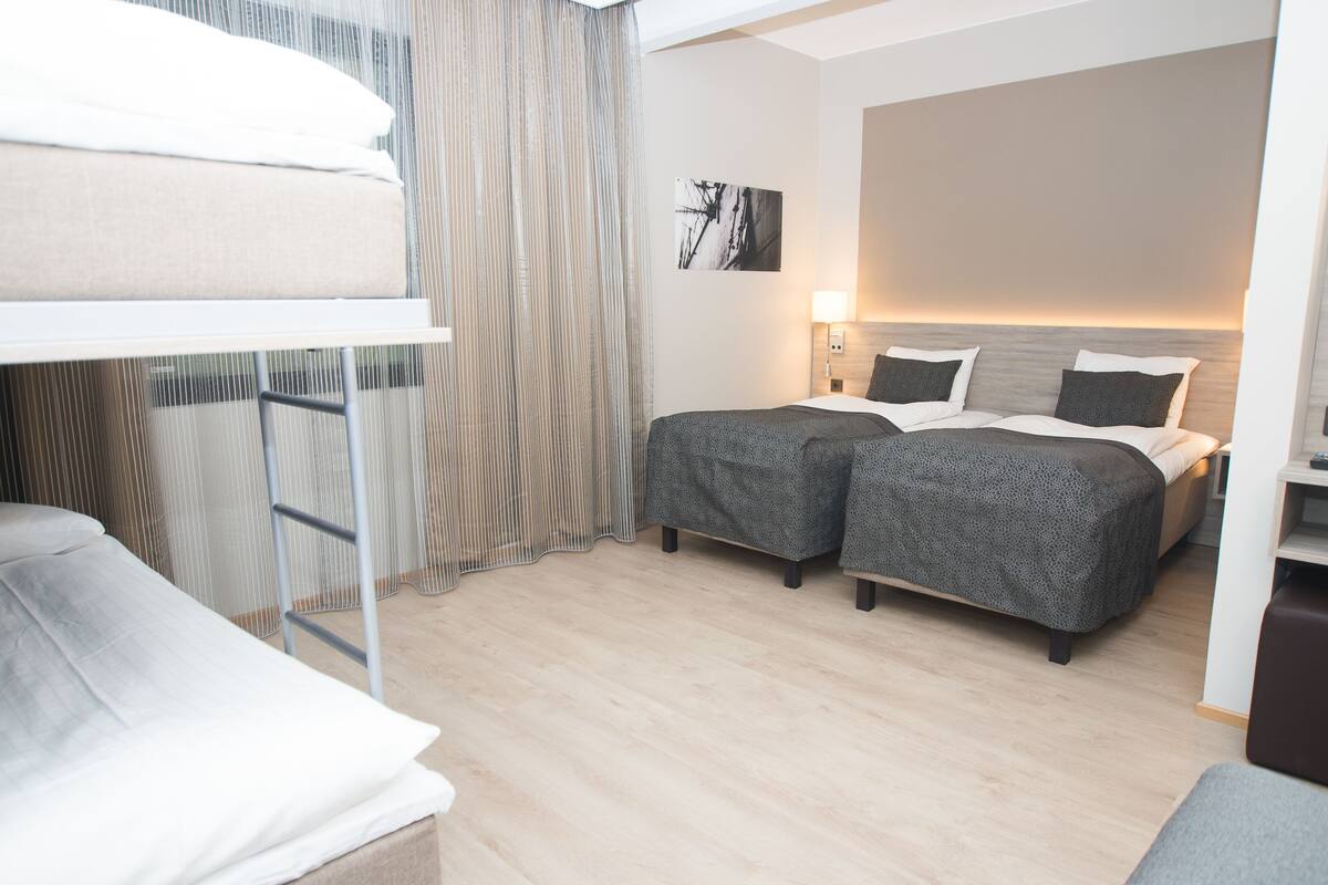 family room | 1 bedroom, desk, blackout curtains, soundproofing