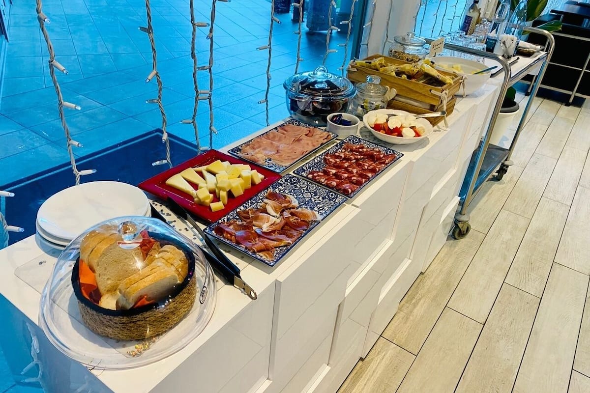 Premium bedding, blackout curtains, soundproofing, iron/ironing board