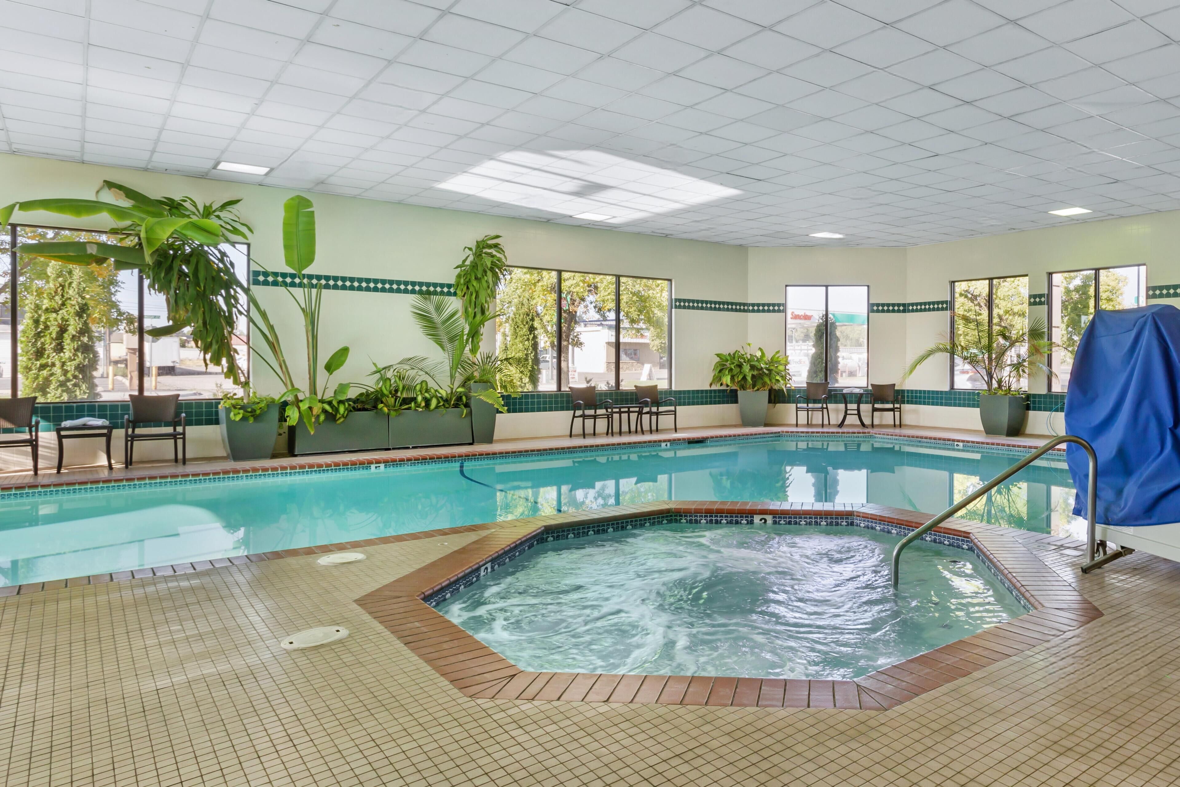 Indoor pool, open 6:00 AM to 11:00 PM, pool loungers