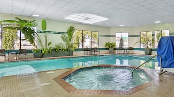 Indoor pool, open 6:00 AM to 11:00 PM, pool loungers