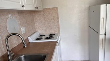 Kamar Deluks, pemandangan samudra | Dapur pribadi | Mesin pembuat kopi/teh, lemari es besar, dan oven