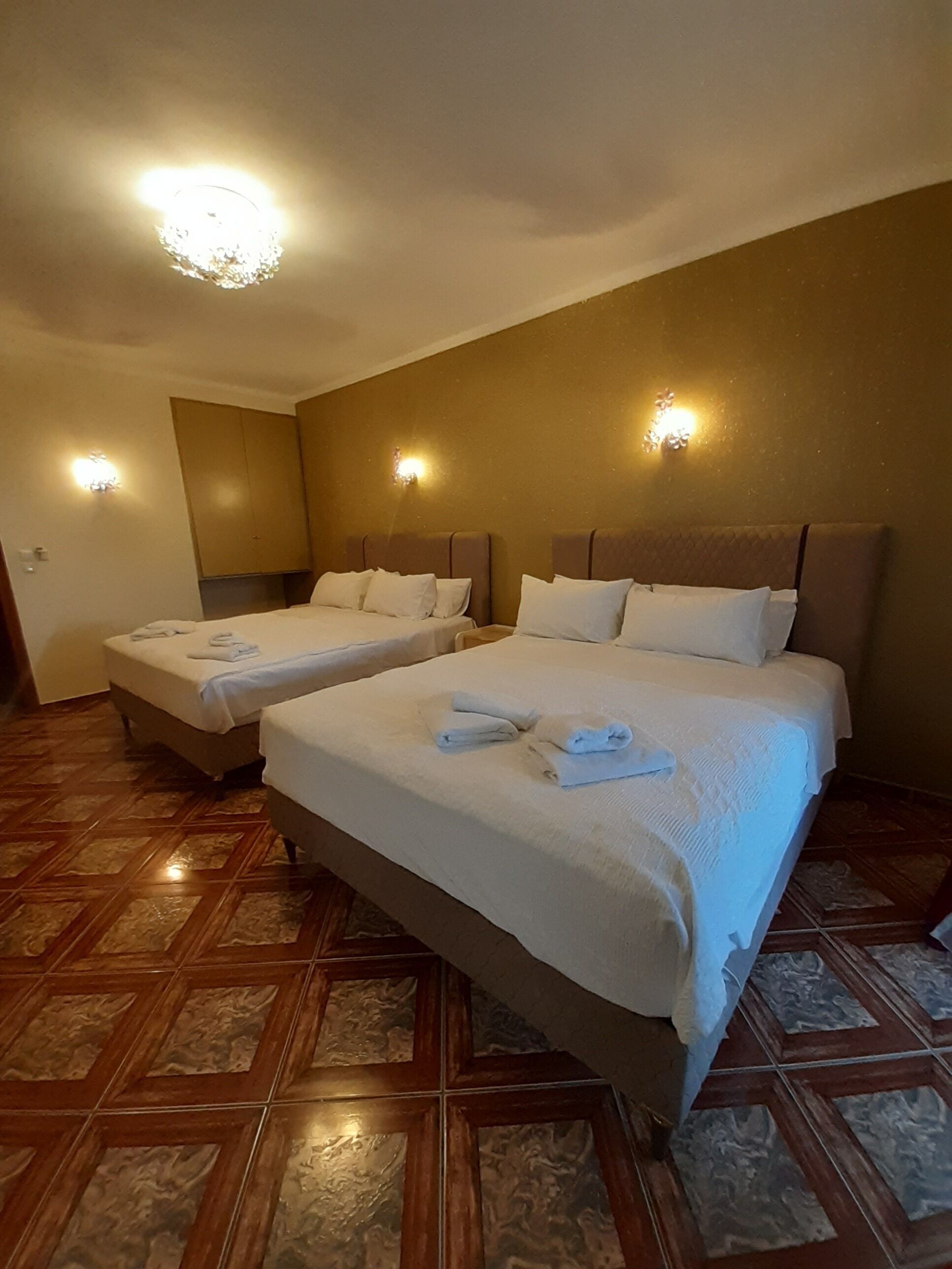 family room, 2 queen beds, courtyard view, ground floor | premium bedding, in-room safe, individually decorated