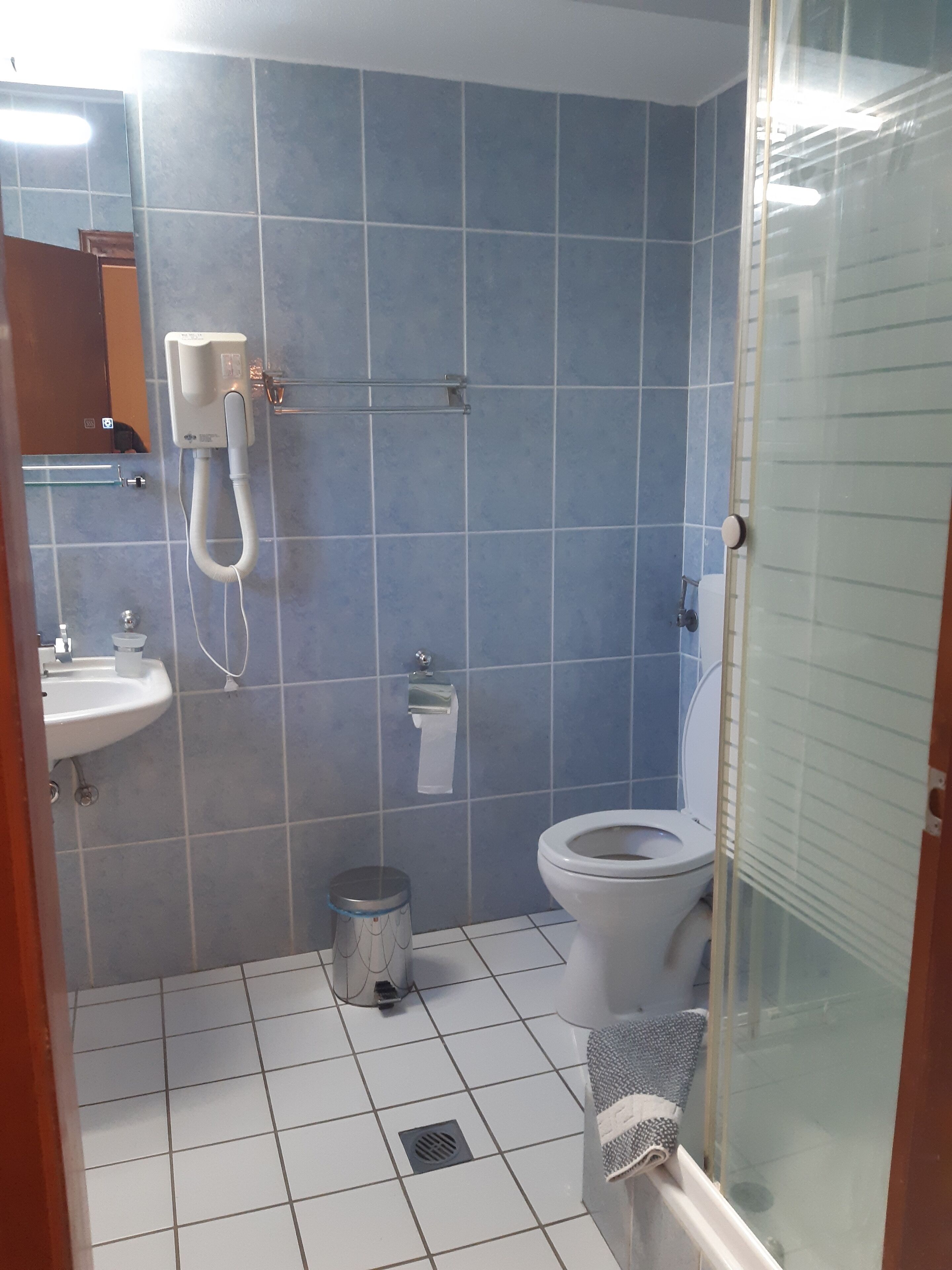 family room, 2 queen beds, courtyard view, ground floor | bathroom | shower, rainfall showerhead, free toiletries, hair dryer