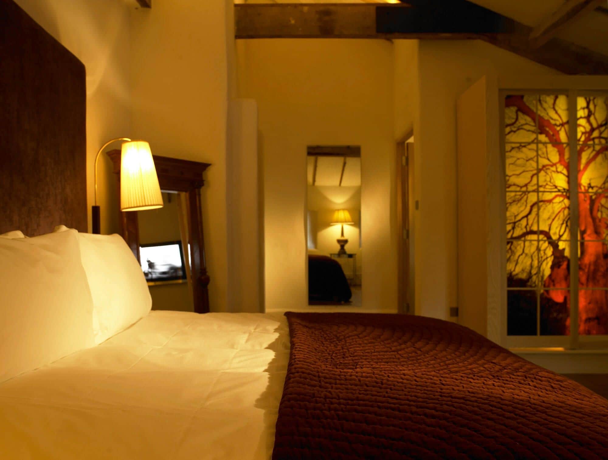 designer toiletries, hair dryer, towels