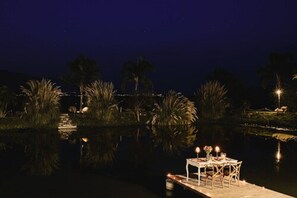 Breakfast, lunch, dinner served; international cuisine, pool views 