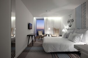 Superior Double Room, Sea View | Minibar, in-room safe, desk, soundproofing