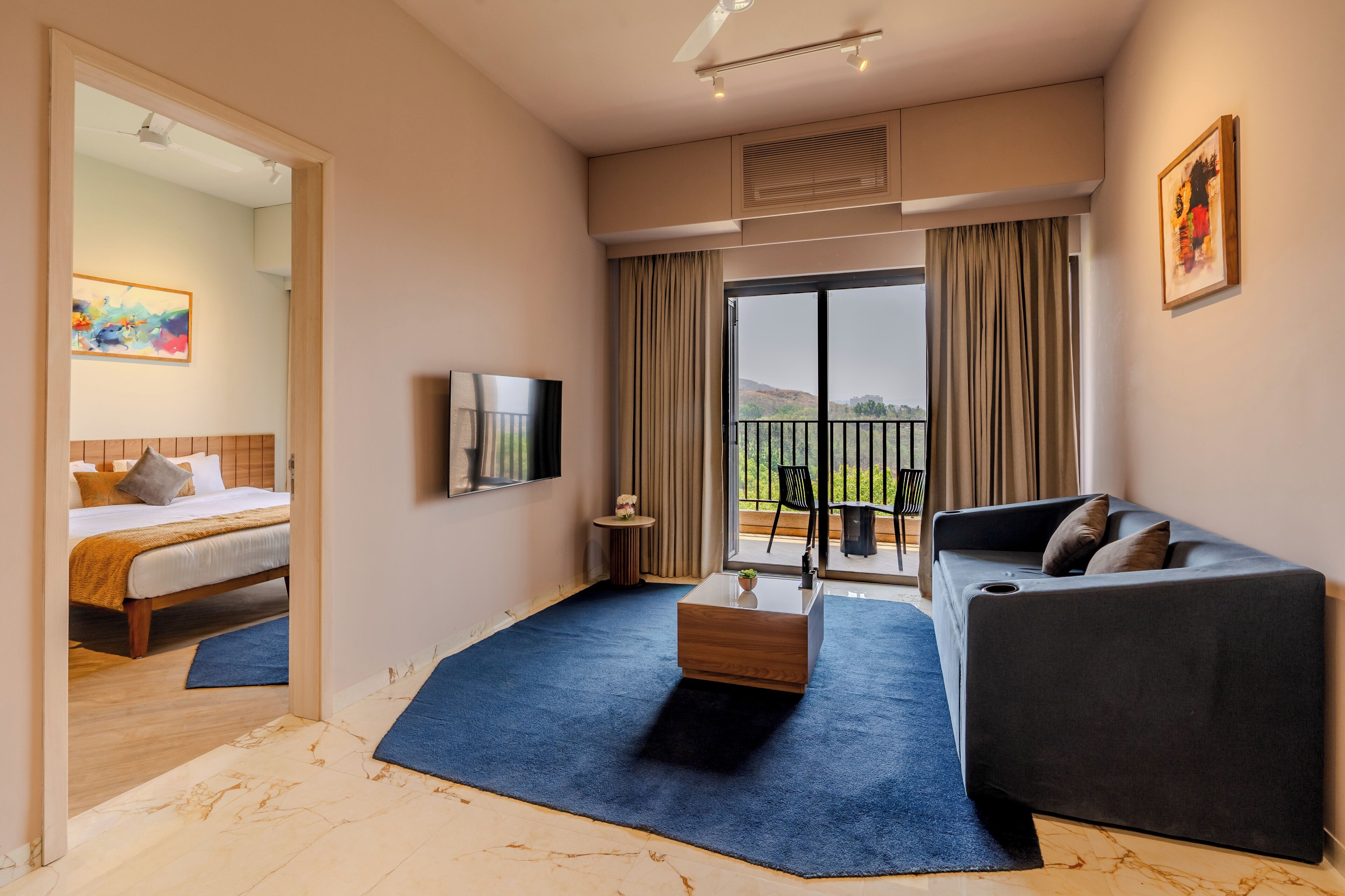 suite, 1 bedroom, kitchenette, golf view (813 sqft., living room 2 x ensuite) | 1 bedroom, minibar, in-room safe, individually decorated