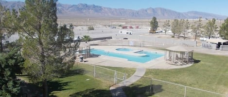 Seasonal outdoor pool, pool umbrellas, sun loungers