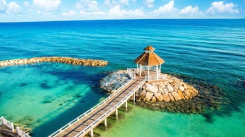 Private beach, white sand, sun-loungers, beach umbrellas