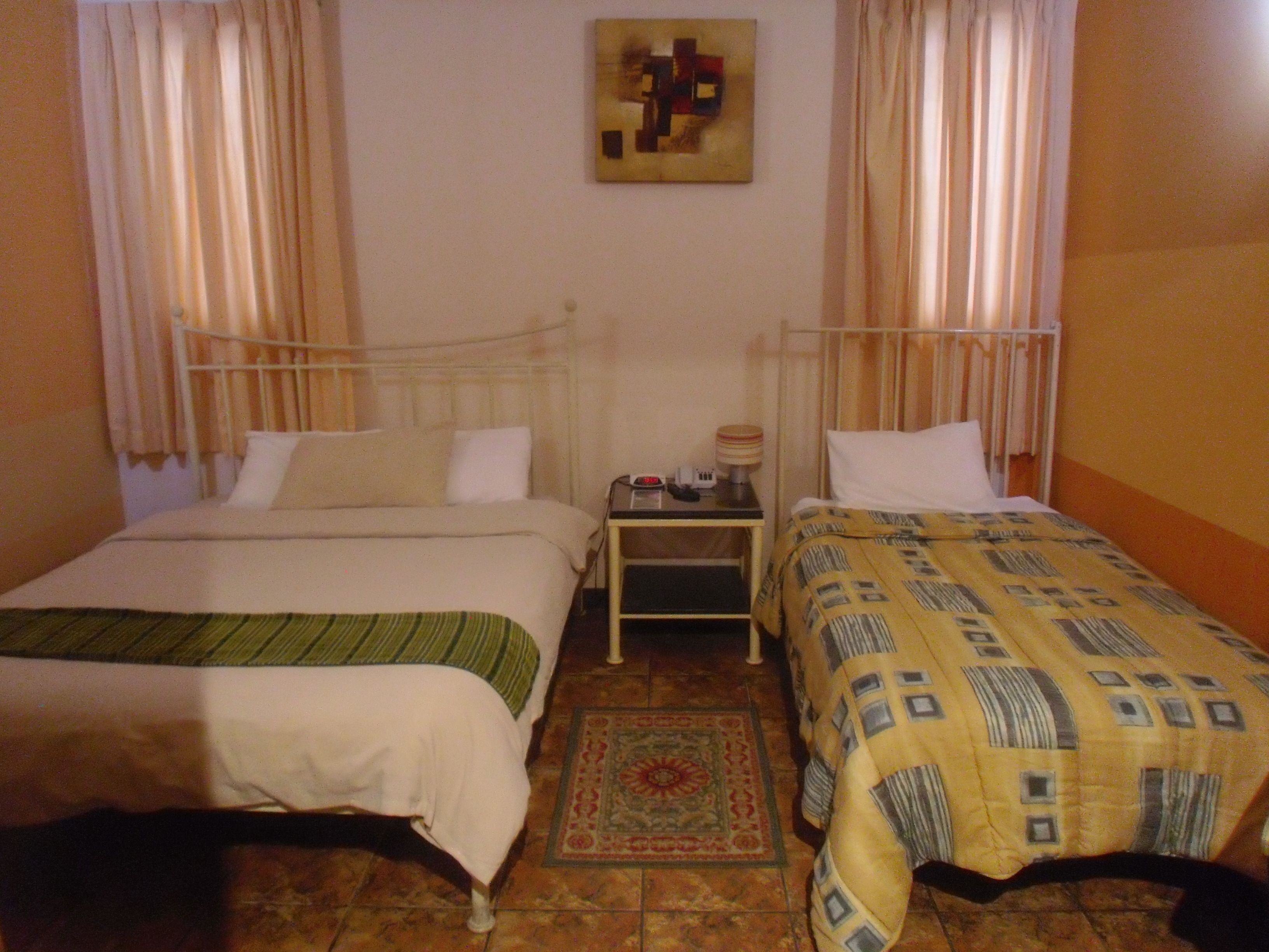 standard triple room | premium bedding, down duvets, in-room safe, individually decorated