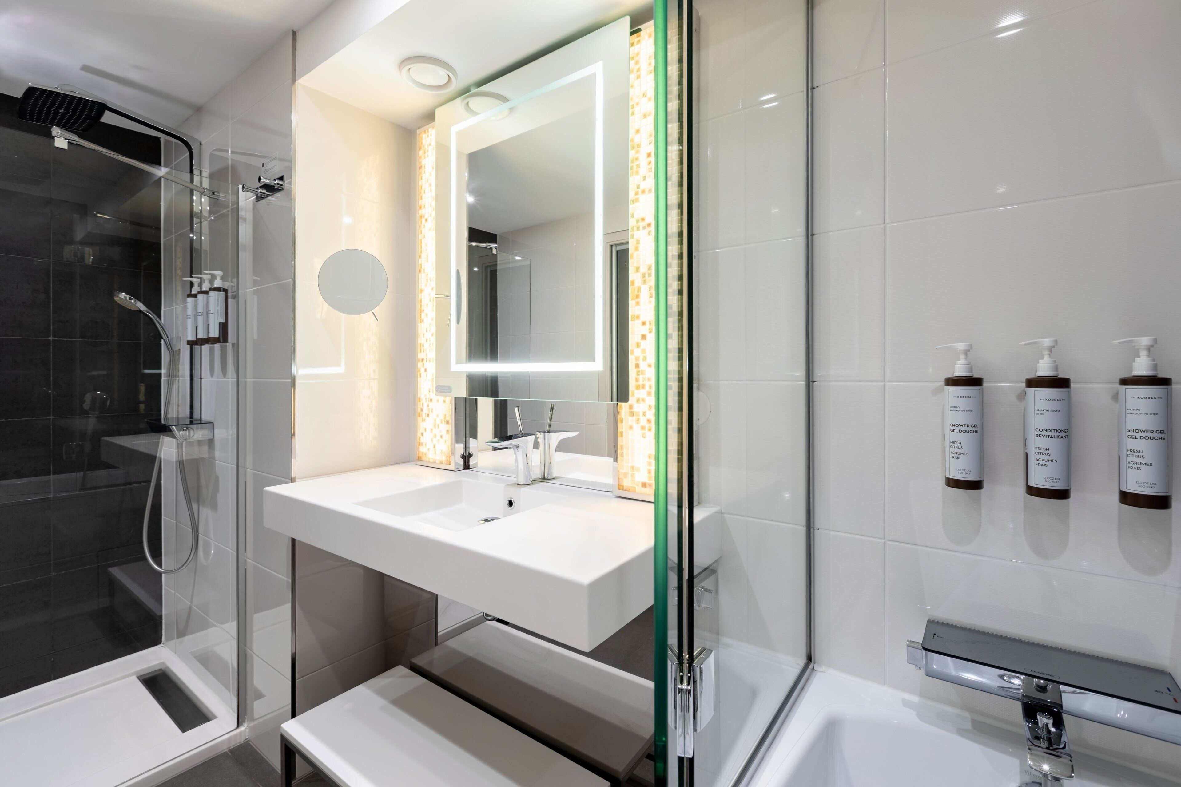 junior suite, 1 king bed, non smoking | bathroom | rainfall showerhead, free toiletries, hair dryer, towels