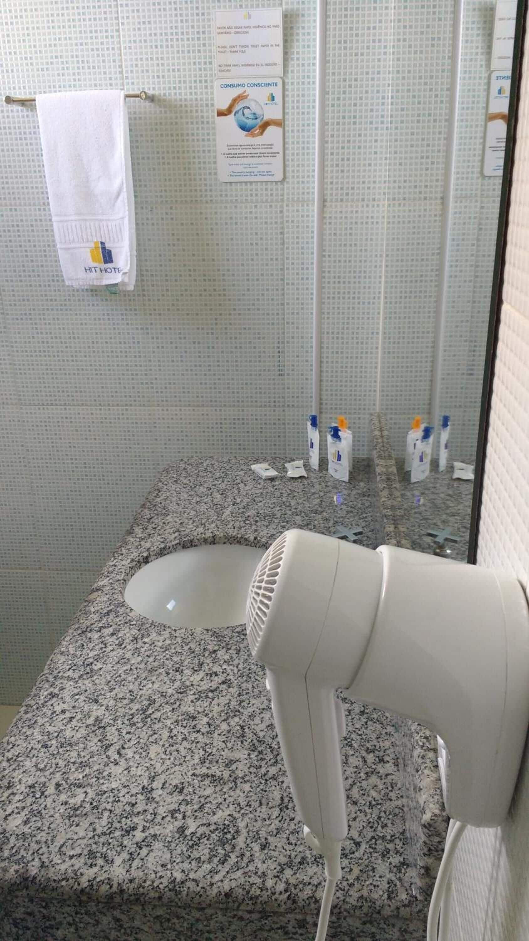 shower, rainfall showerhead, hair dryer, towels