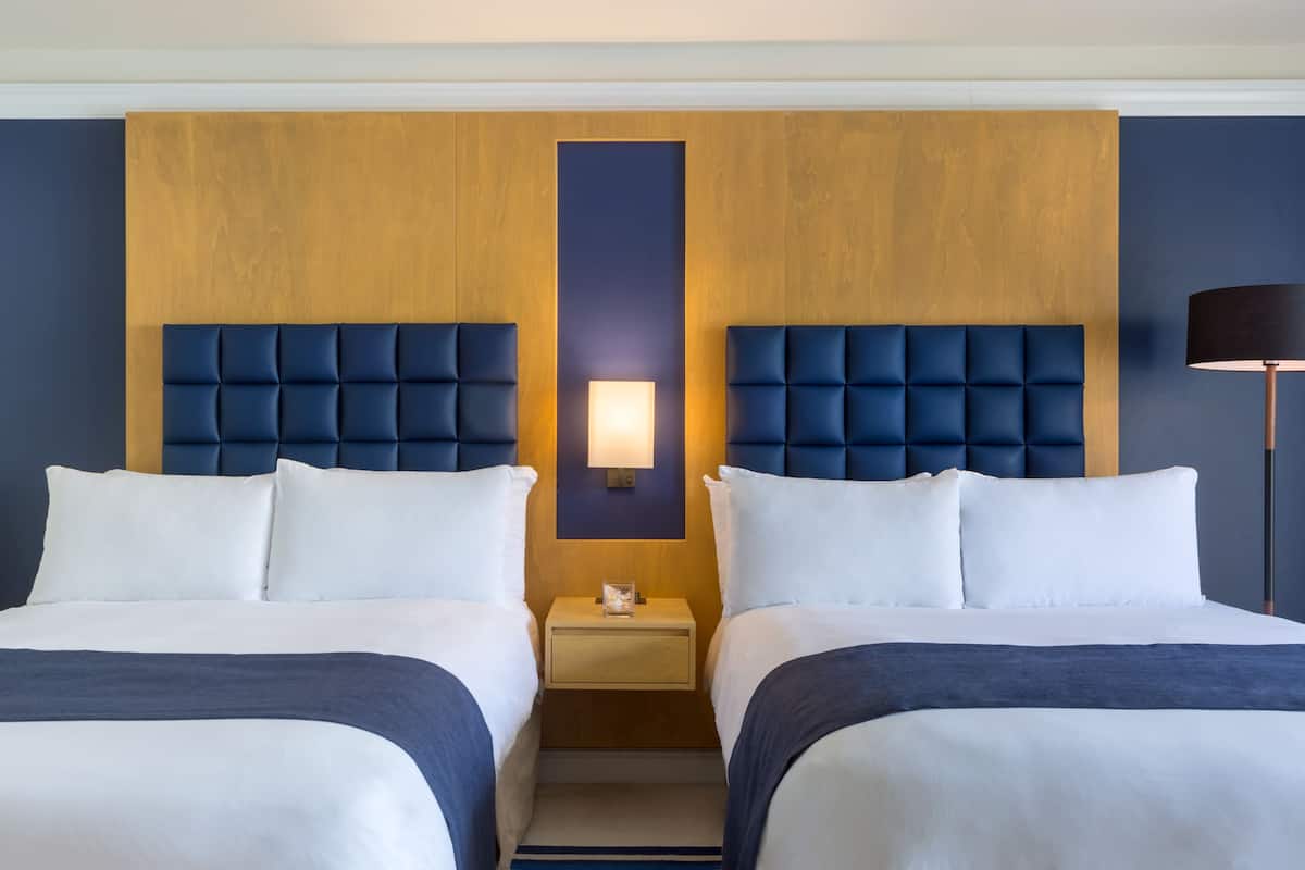 Premium bedding, down comforters, pillowtop beds, minibar