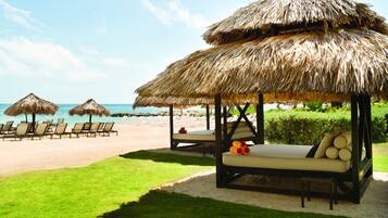 Private beach, white sand, sun loungers, beach umbrellas