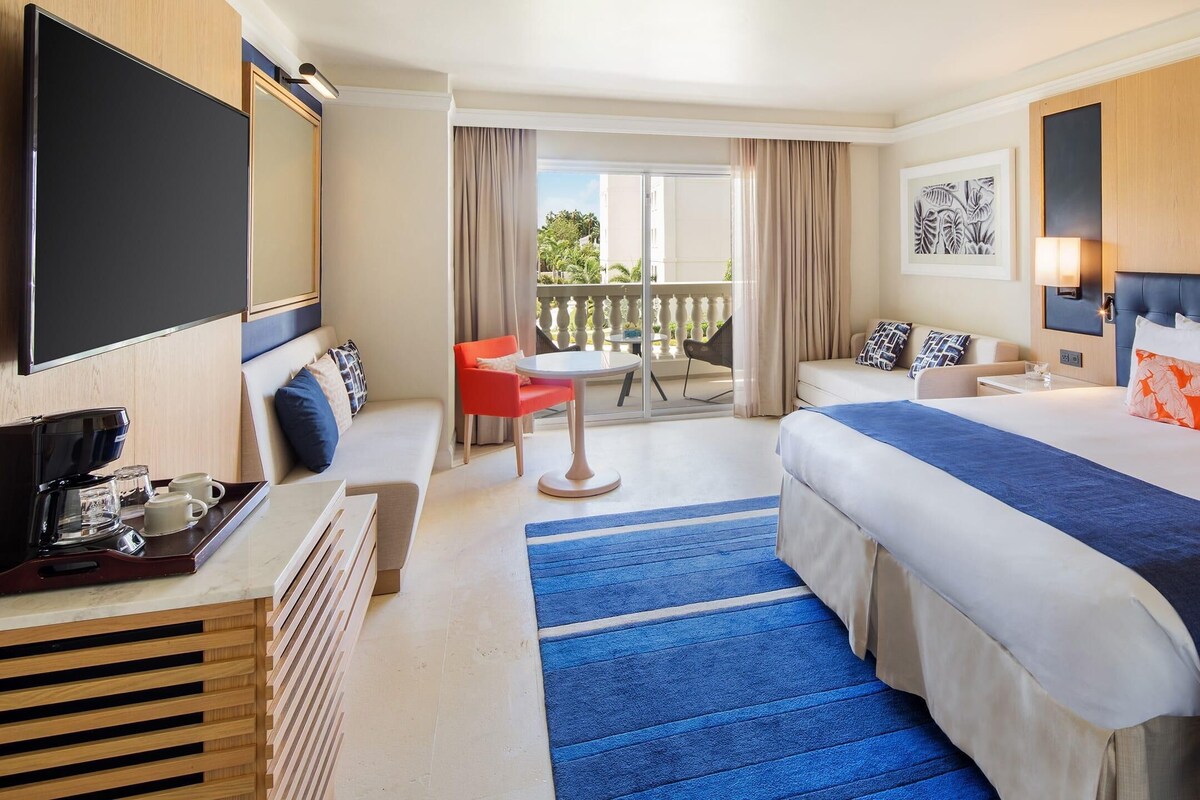 Premium bedding, down comforters, pillowtop beds, minibar
