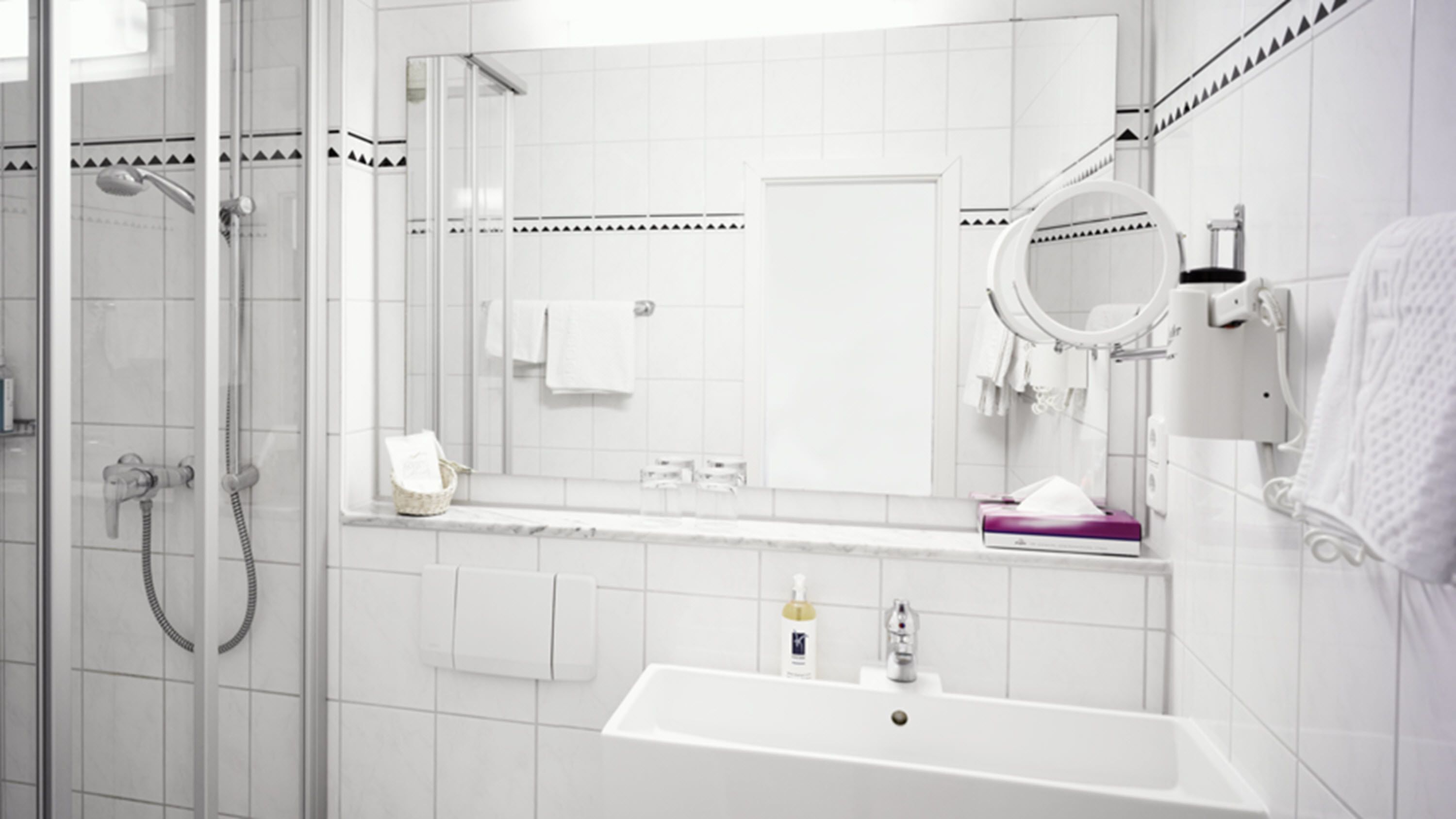 shower, free toiletries, hair dryer, towels