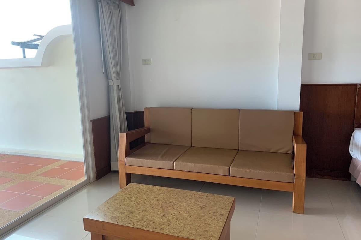 superior suite - leela  | living area | 40-inch tv with satellite channels