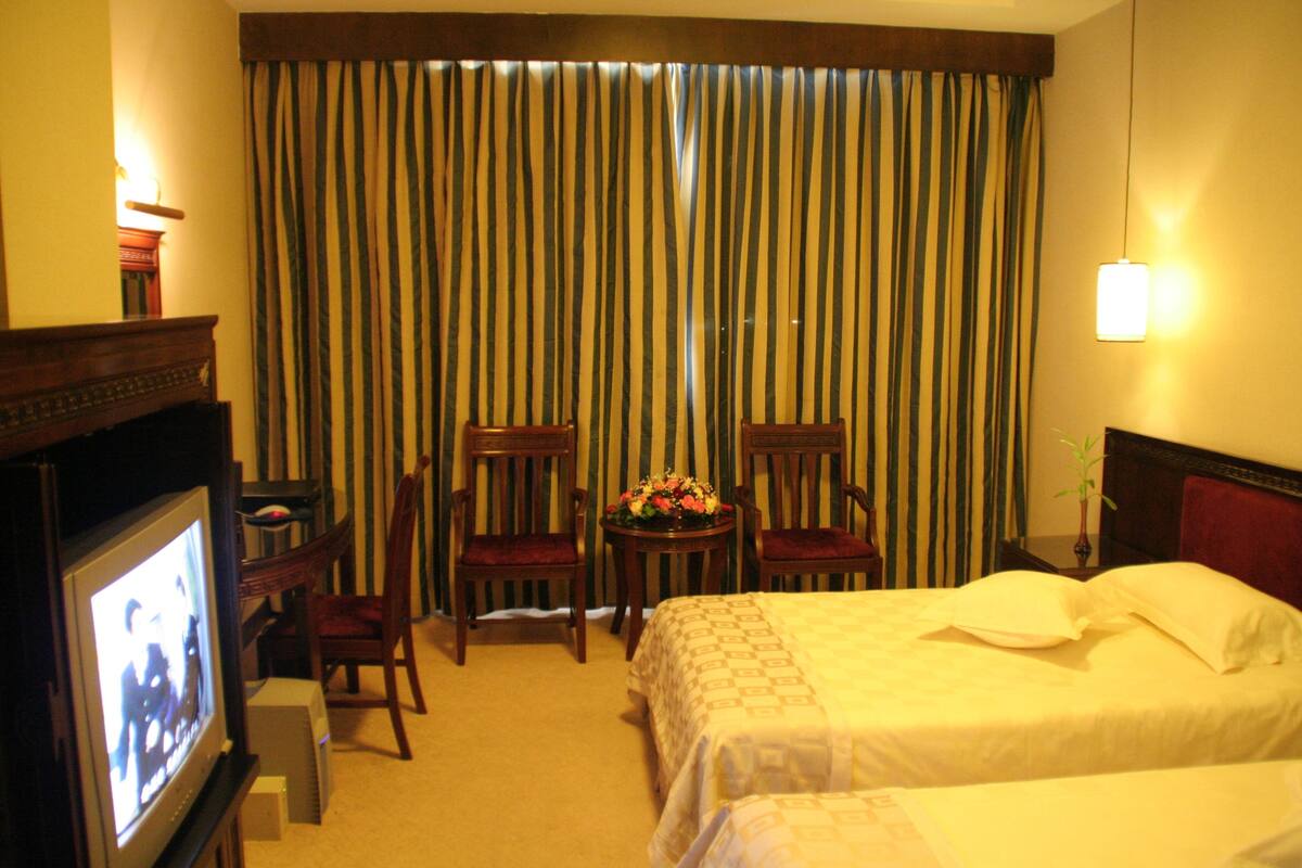 Business Standard | Down comforters, minibar, in-room safe, desk