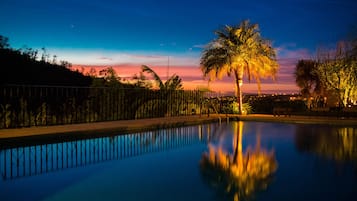 Outdoor pool, open 8:30 AM to 8 PM, pool loungers
