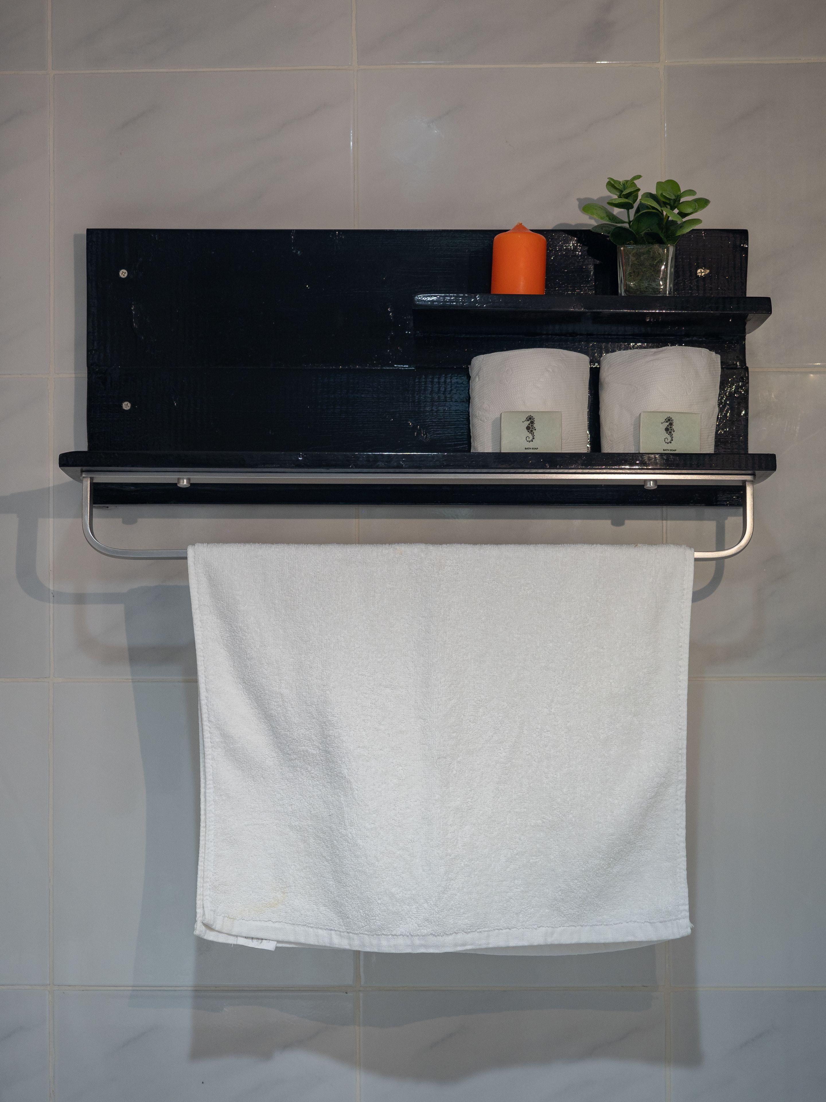 deluxe room | bathroom amenities | shower, towels, soap, shampoo