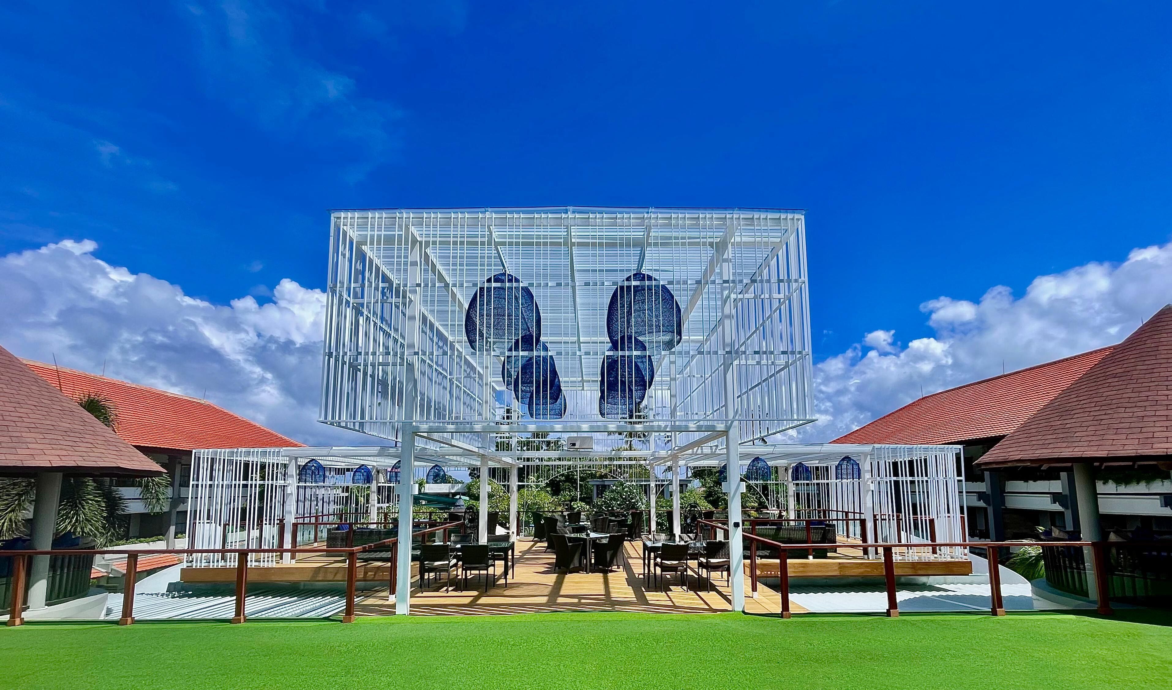A modern building with a glass facade and a central atrium.