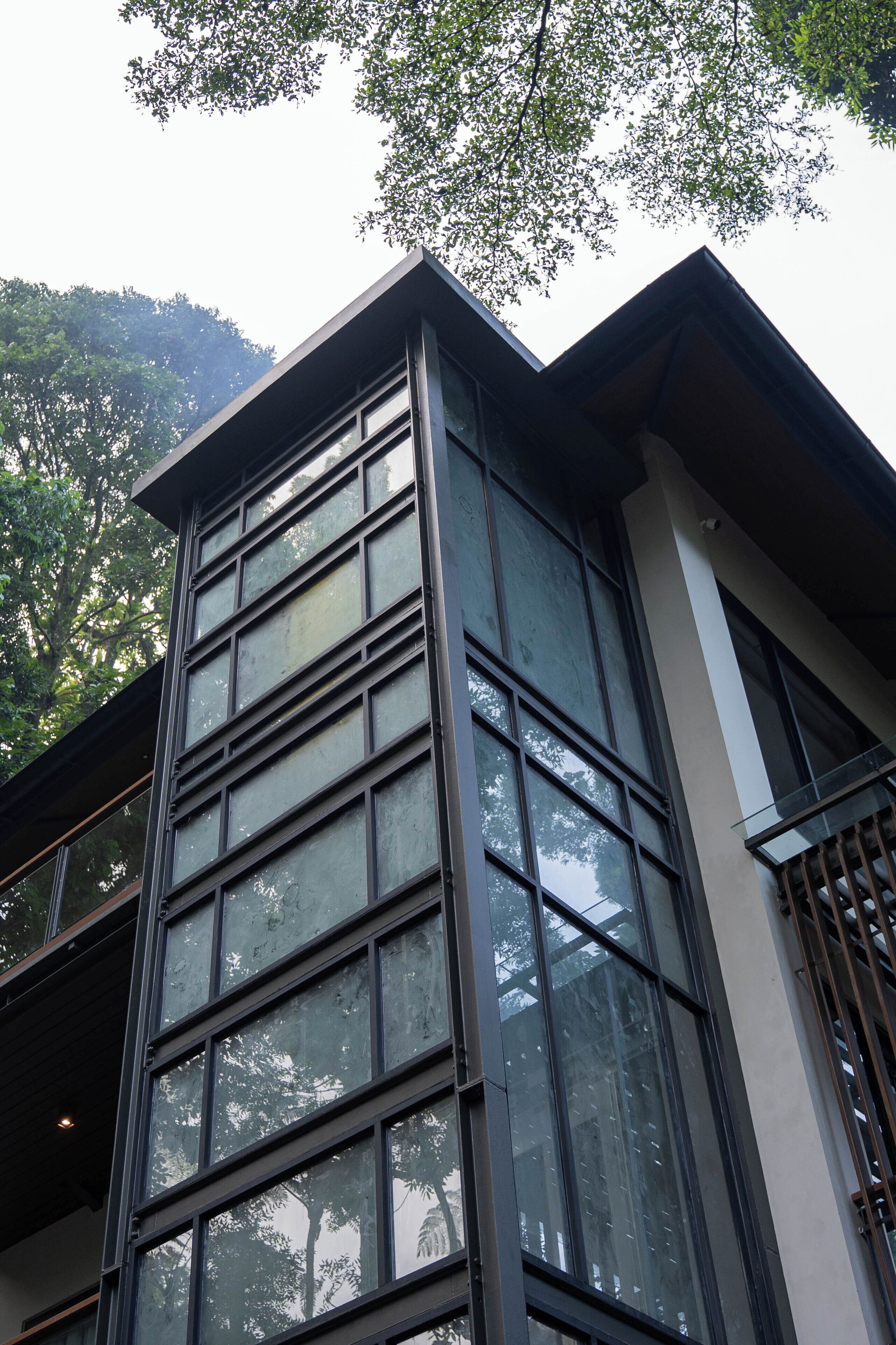 A modern building with large windows and a flat roof.