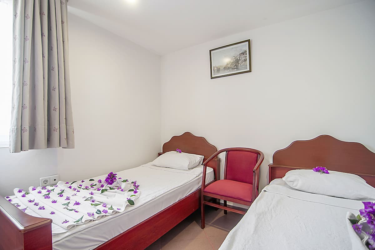 Standaard kamer | Een minibar, een kluis op de kamer, gratis babybedden