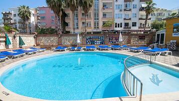 Outdoor pool, pool umbrellas, pool loungers