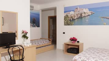 Economy Quadruple Room | Minibar, in-room safe, cots/infant beds, free WiFi