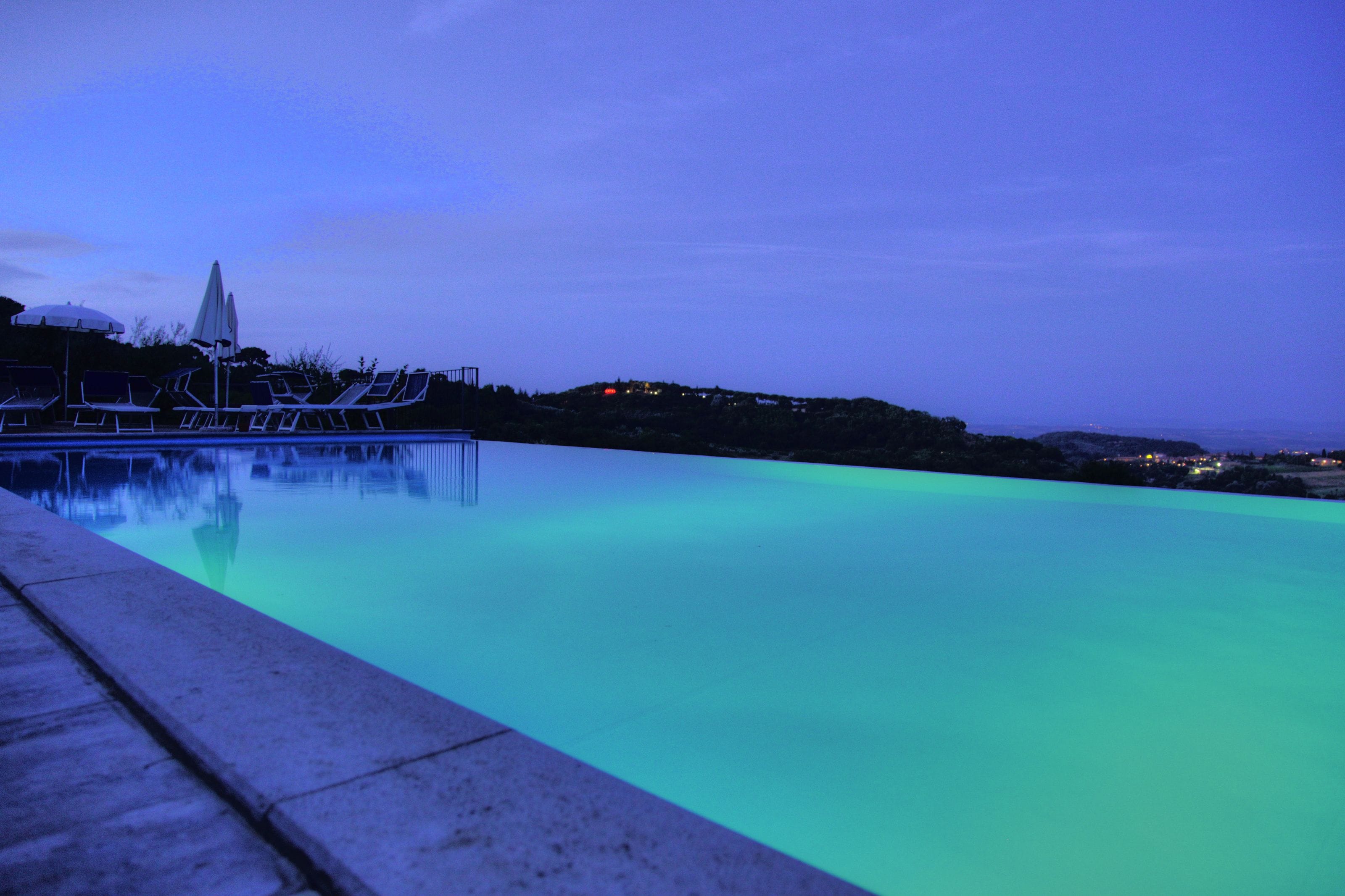 Seasonal outdoor pool, pool umbrellas, sun loungers