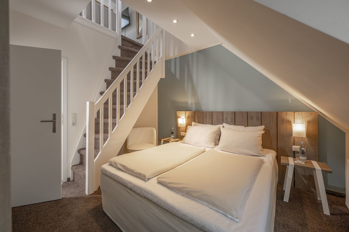 Maisonnette | Pillowtop-bedden, een kluis op de kamer, een bureau
