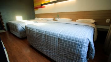 Standard Twin Room, 2 Double Beds | Minibar, in-room safe, desk, blackout drapes