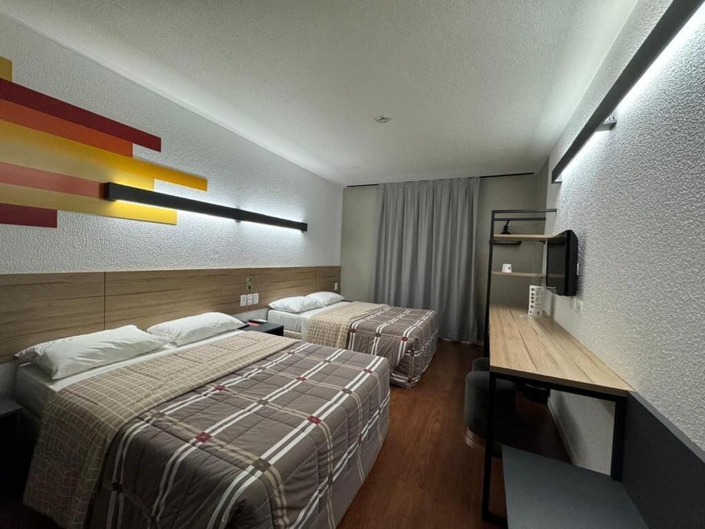 standard room, 2 double beds | 1 bedroom, minibar, in-room safe, desk
