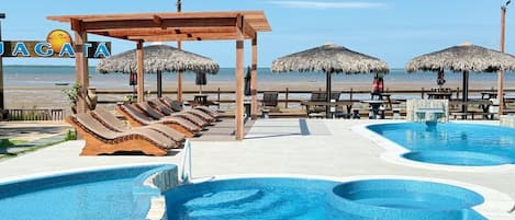 2 outdoor pools, open 10:00 AM to 6:00 PM, pool umbrellas, sun loungers