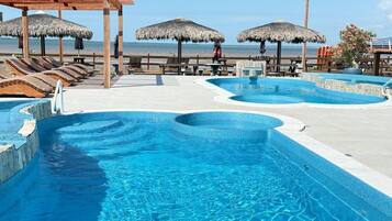 2 outdoor pools, open 10:00 AM to 6:00 PM, pool umbrellas, sun loungers