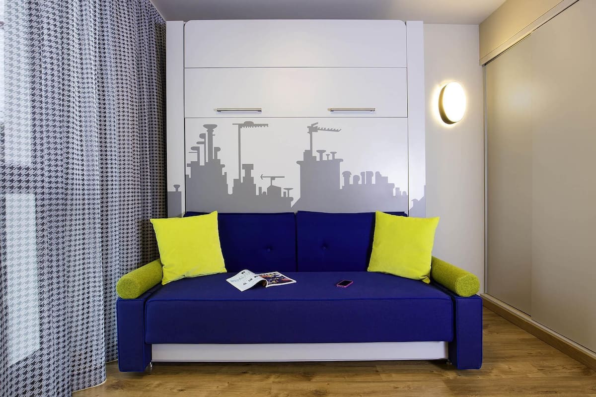 Estudio, 1 cama matrimonial | Ropa de cama hipoalergénica y caja de seguridad en la habitación