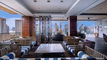 Outdoor pool, open 7:00 AM to 9:00 PM, pool umbrellas, sun loungers