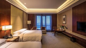 Ropa de cama de alta calidad y minibar