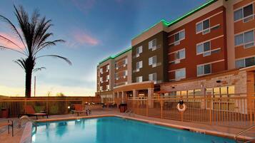 Outdoor pool, open 6 AM to 11 PM, pool umbrellas, sun loungers