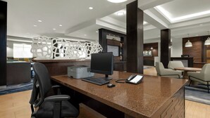 A modern office space with a large desk, computer, and office chair. - Fairfield Inn & Suites Riverside Corona/Norco (Norco)