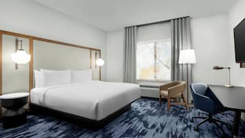 Desk, blackout drapes, iron/ironing board, free cribs/infant beds