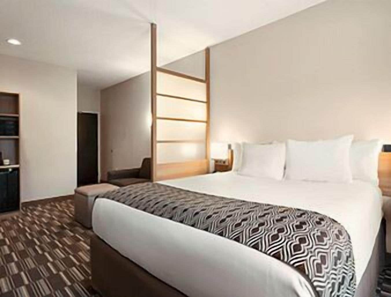 desk, laptop workspace, blackout curtains, iron/ironing board