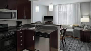 Suite, 2 Bedrooms | Desk, laptop workspace, soundproofing, iron/ironing board